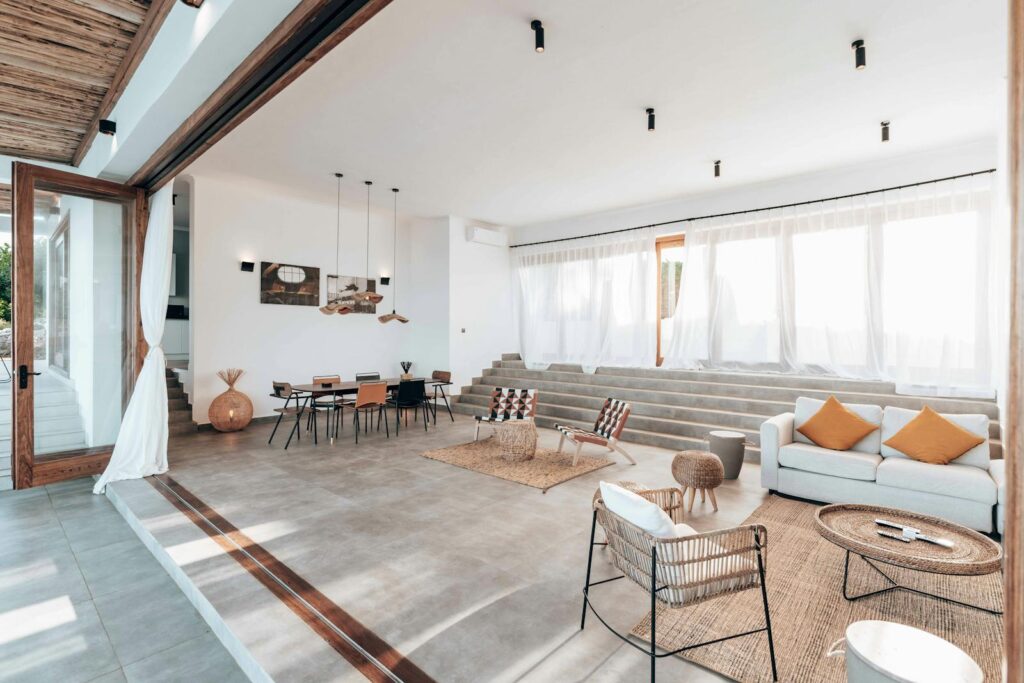 Spacious modern living room featuring open plan design with ample natural light.