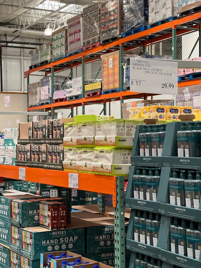 Bulk products displayed on shelves in a wholesale warehouse setting.