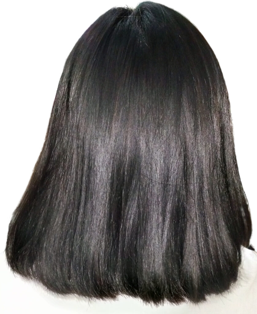 Rear view of a student girl with a bob haircut (cropped 2)