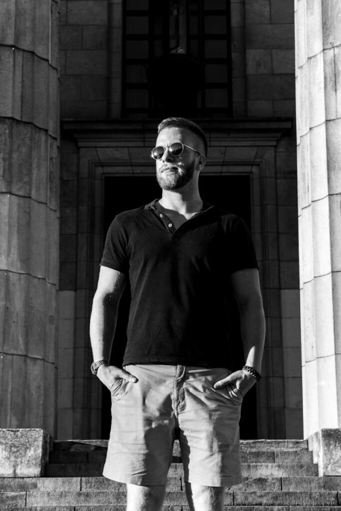 Black and white portrait of a stylish man in urban Buenos Aires, Argentina.