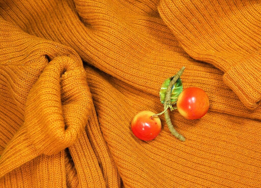 sweater, woolen sweater, knitwear, knitted, woman, warm, winter, cold, comfort, pullover, garment, clothing, fashion, ornament, pin, brooch, orange fashion, orange clothes, sweater, sweater, woolen sweater, knitwear, knitted, pullover, pullover, brooch, brooch, brooch, brooch, brooch, orange clothes