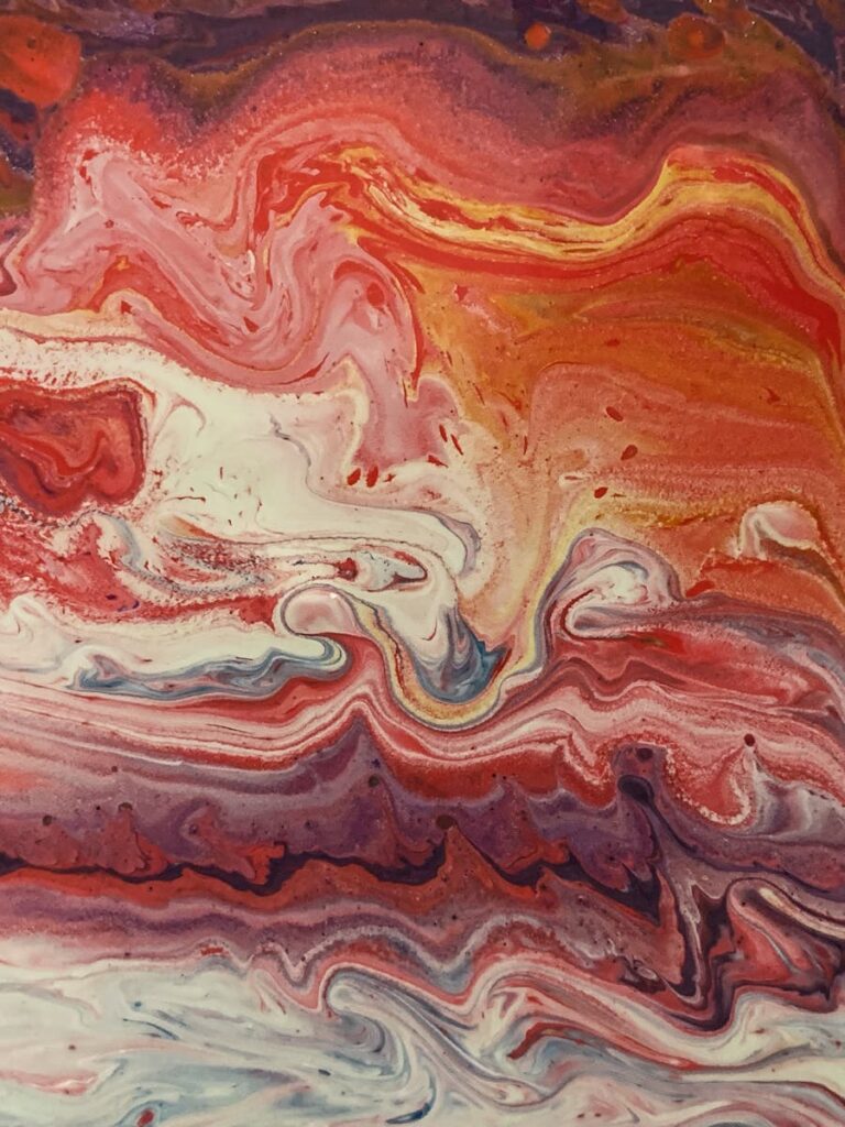 Dynamic abstract painting featuring swirling red and white hues with a contemporary fluid art style.