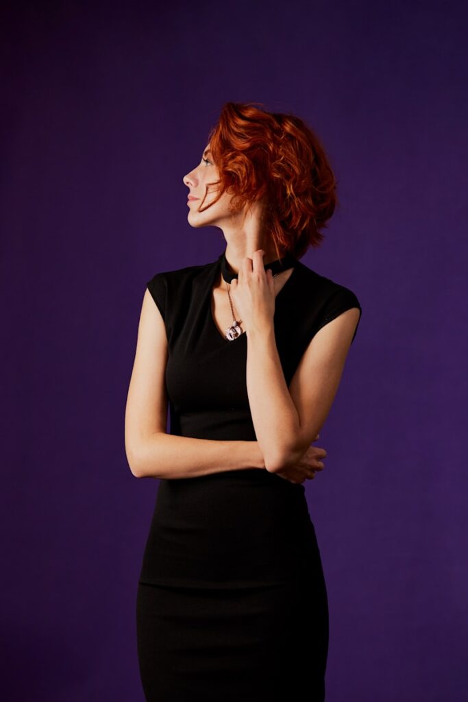 woman in black sleeveless dress