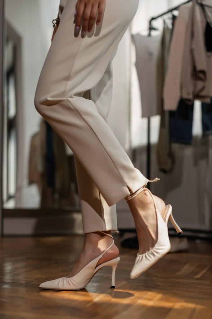 Elegant and stylish beige heels showcased indoors with natural lighting.