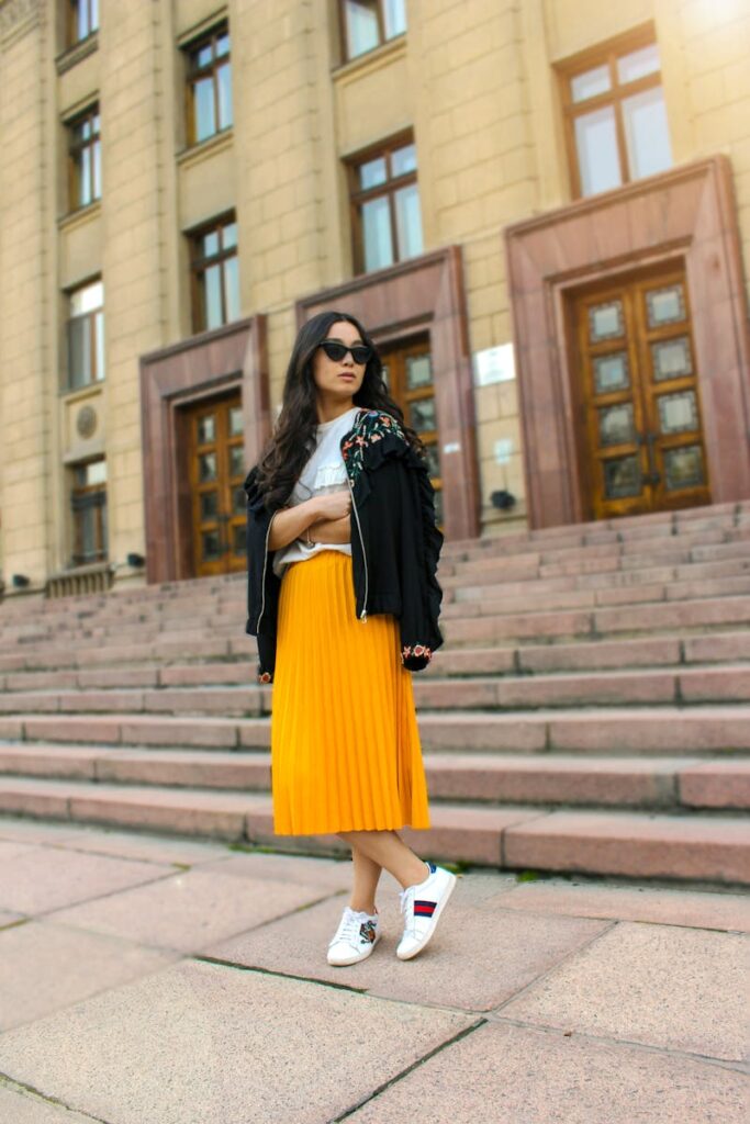 Fashionable woman posing in Almaty, Kazakhstan on a sunny day.