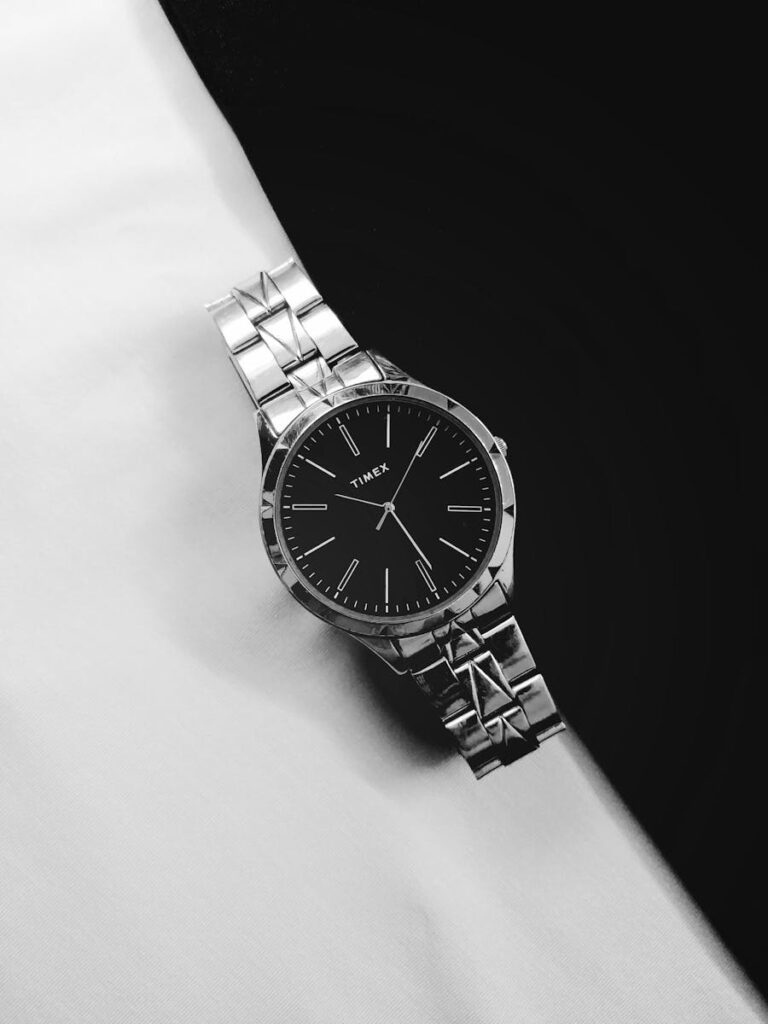 Timex watch showcasing elegance and precision with a classic black and white aesthetic.