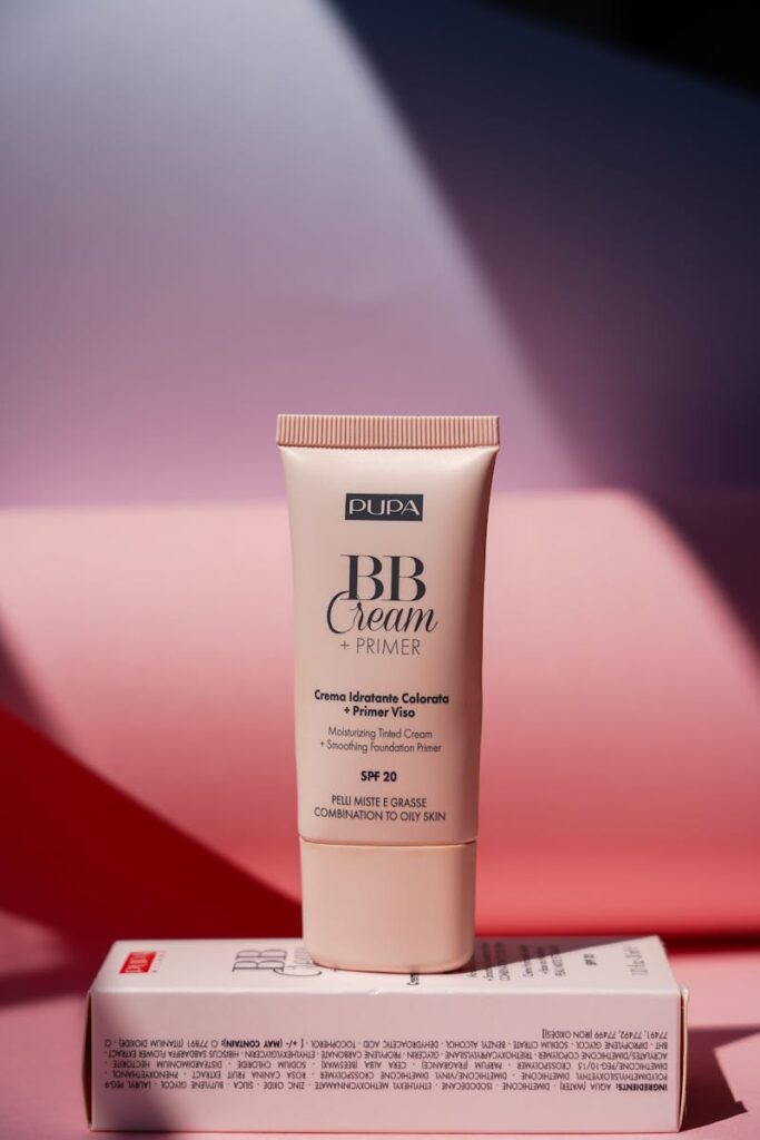 Luxurious BB Cream and Primer with SPF 20 showcased elegantly on a modern gradient backdrop.