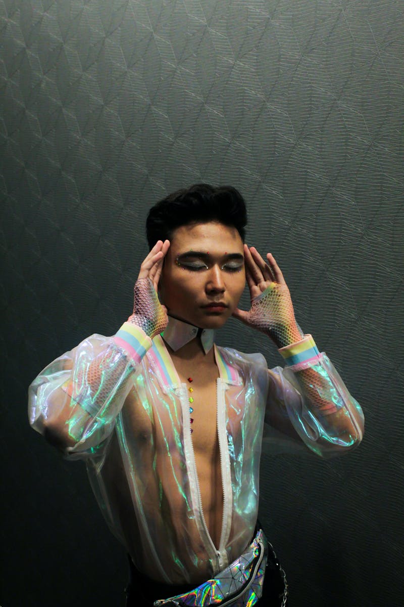 Stylish portrait of a model in a metallic jacket, expressing contemporary fashion.