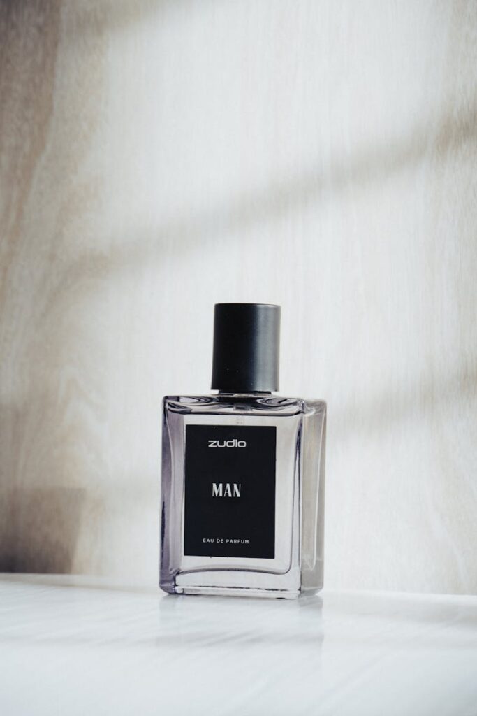 Close-up of a luxury perfume bottle in soft natural light.