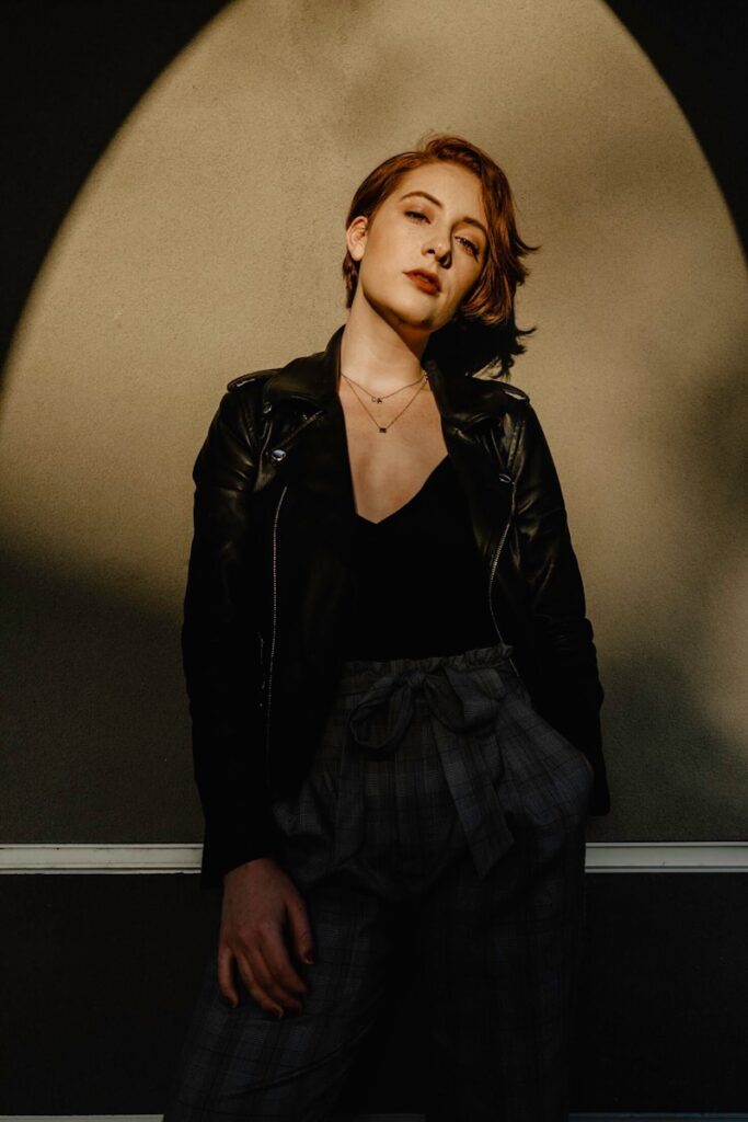 woman wearing black leather jacket