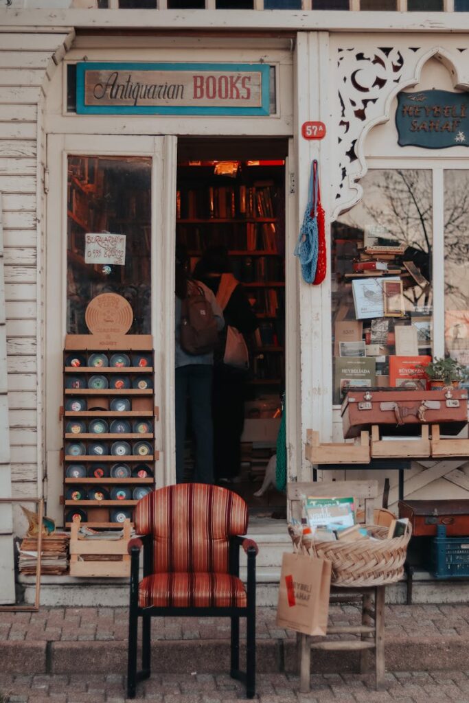 Explore a vintage shop front featuring books and antiques for a nostalgic shopping experience.