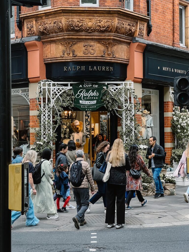 People walking past a Ralph Lauren store at Sloane Square in London.