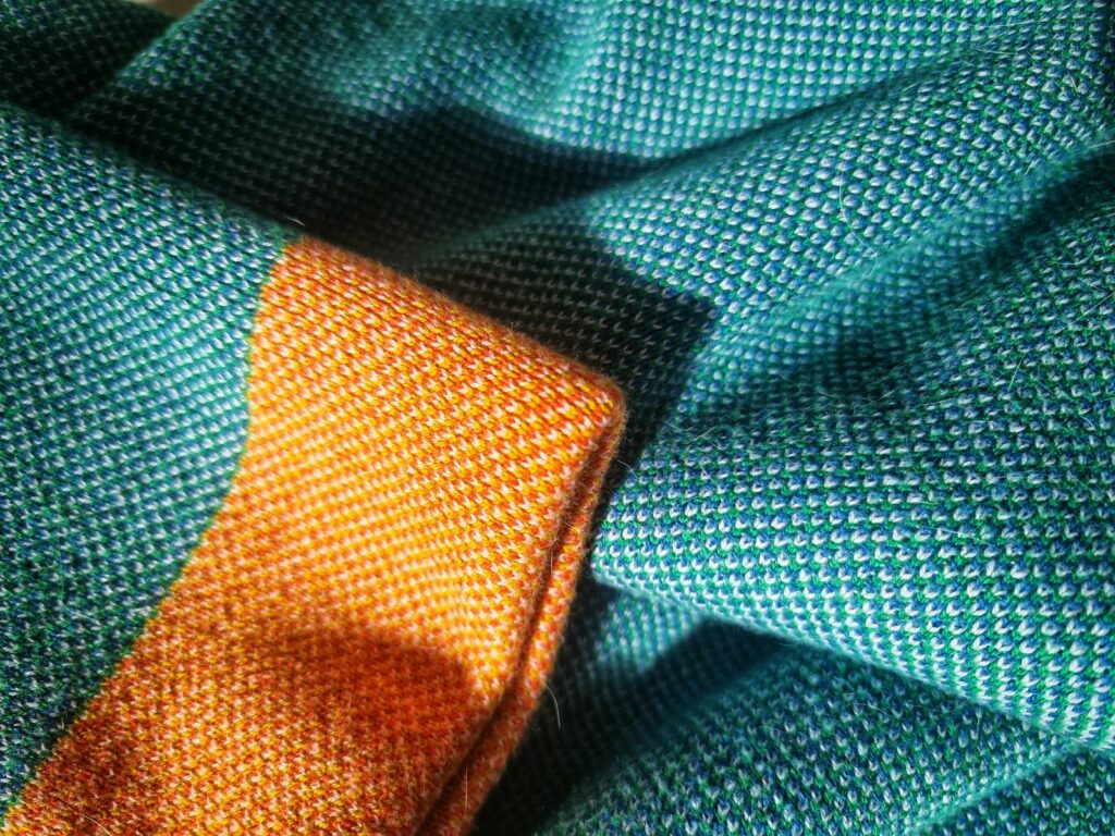 A close up of a blue and orange tie