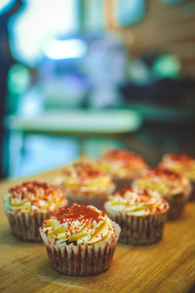 Indulge in fresh red velvet cupcakes topped with creamy frosting. Perfect for dessert lovers.