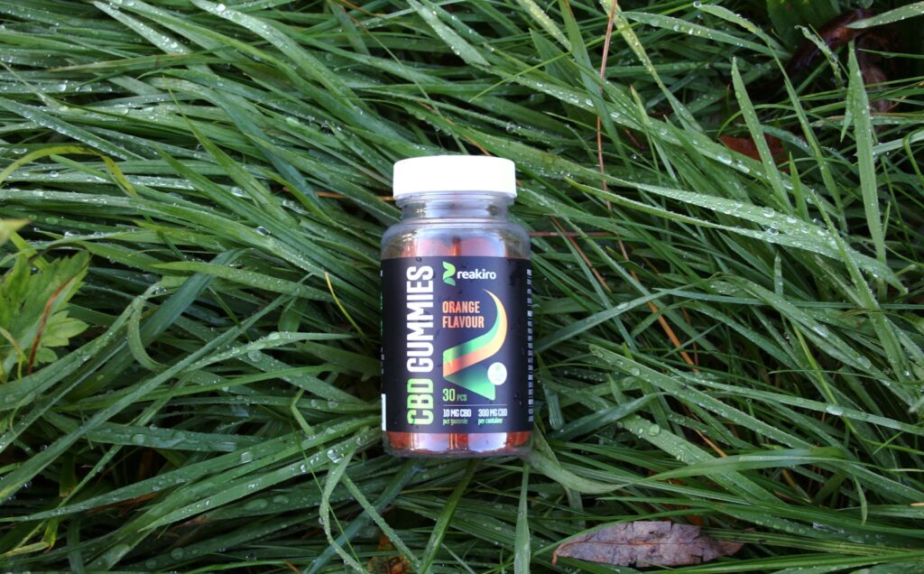 a small container of food on grass