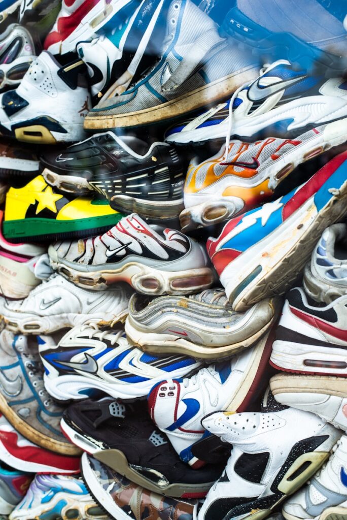 a pile of colorful shoes sitting next to each other