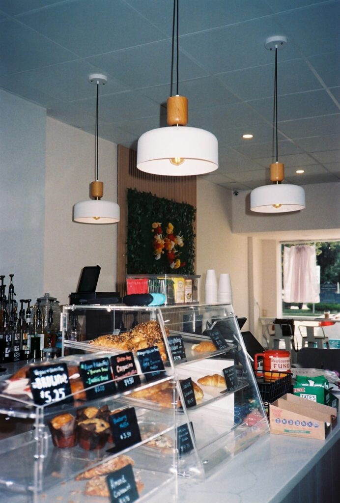 A bakery with a lot of donuts on display