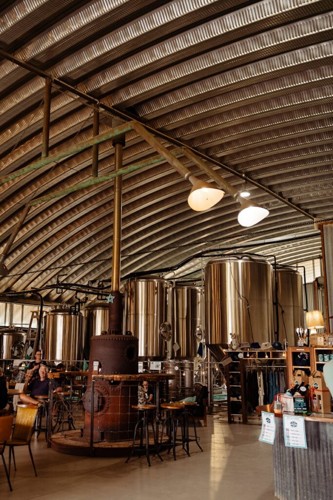 a large room filled with lots of tables and chairs