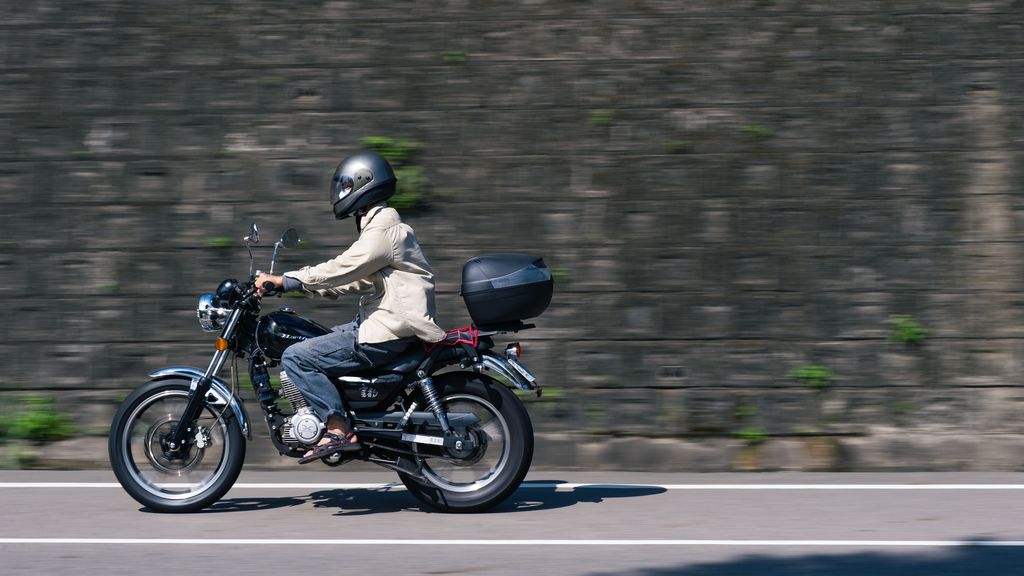2021-10-31 man riding motorcycle in Daxi, Taiwan