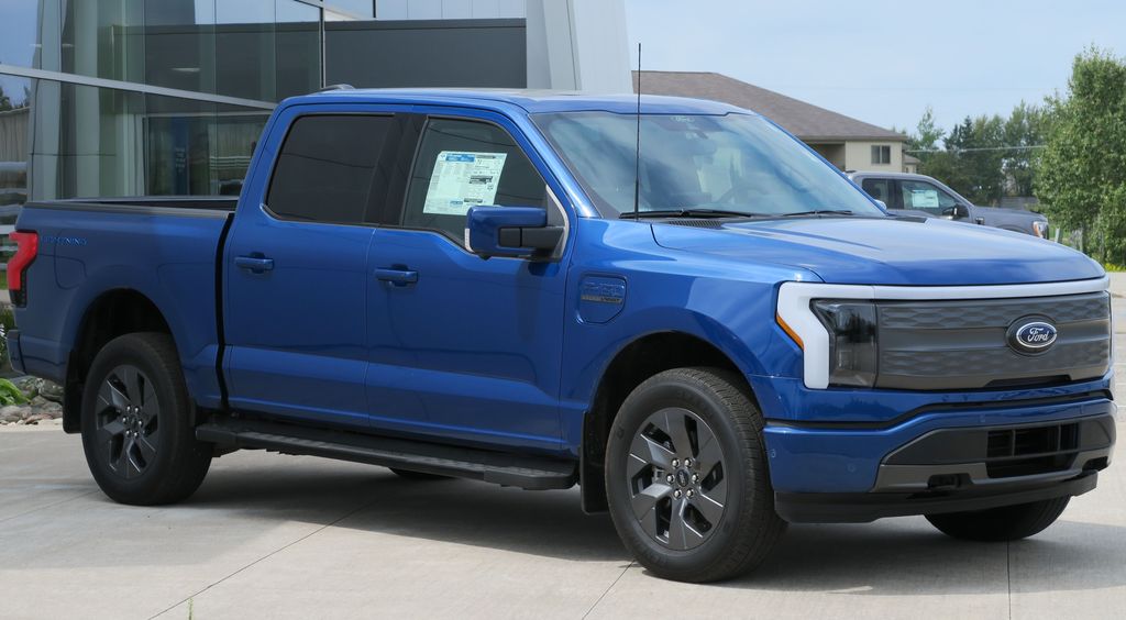 2022 Ford F-150 Lightning Lariat in Atlas Blue Metallic, Front Right, 08-06-2022