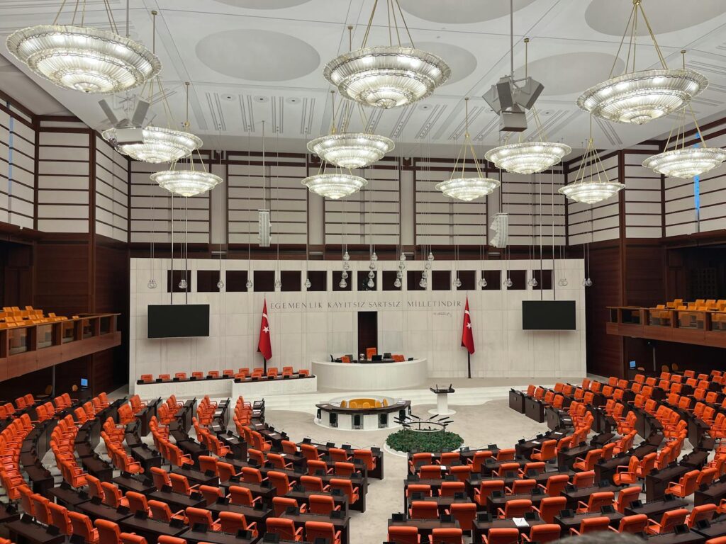 Wide view of the Turkish Parliament interior in Ankara showcasing its modern design and grand architecture.