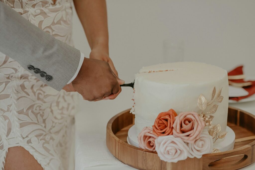 person holding pink rose bouquet