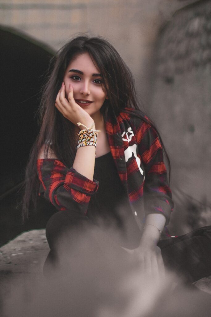 woman wearing black and red dress shirt