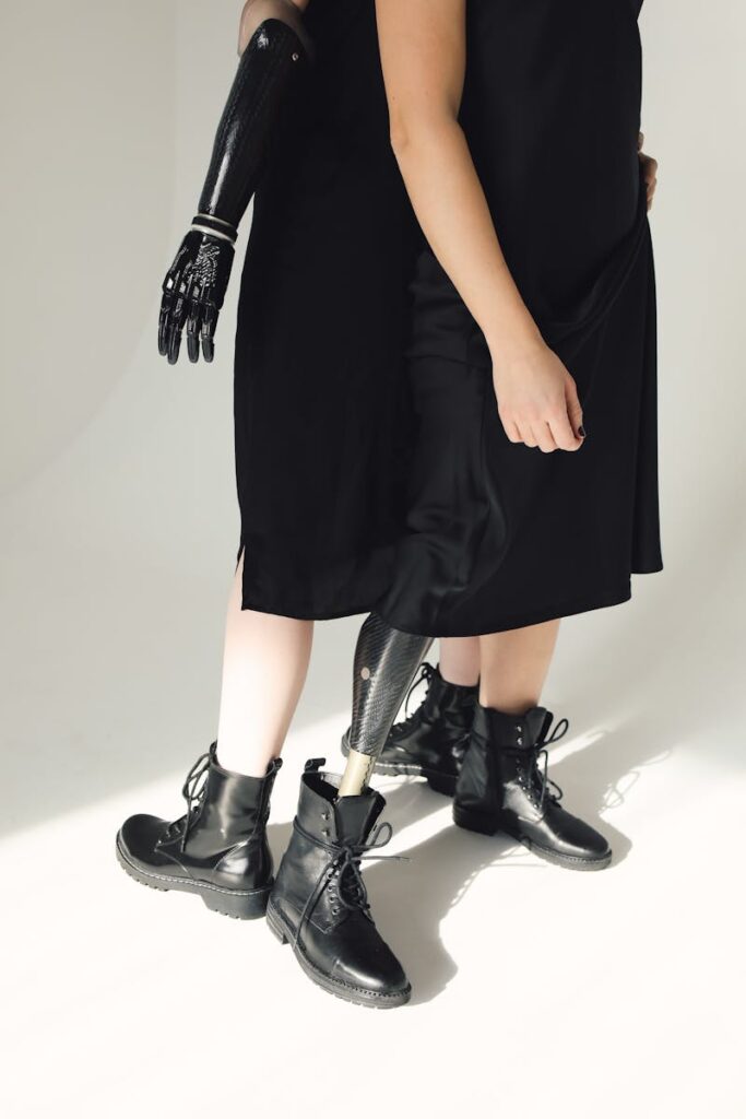 Elegant fashion with prosthetic limbs, embracing style and inclusivity.