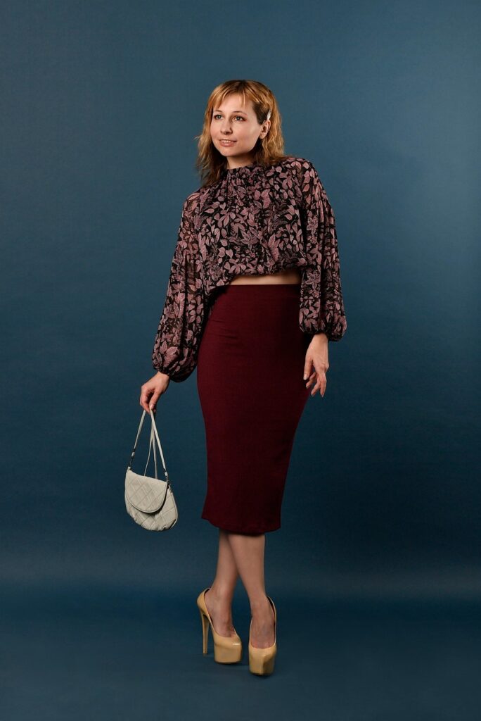 woman, in full growth, elegantly, lady, madame, handbag, blouse, shoes, skirt, midi, pencil skirt, fashion, style, posing, studio, blue background, iphone wallpaper, handbag, blouse, skirt, skirt, skirt, skirt, skirt, pencil skirt, pencil skirt, pencil skirt