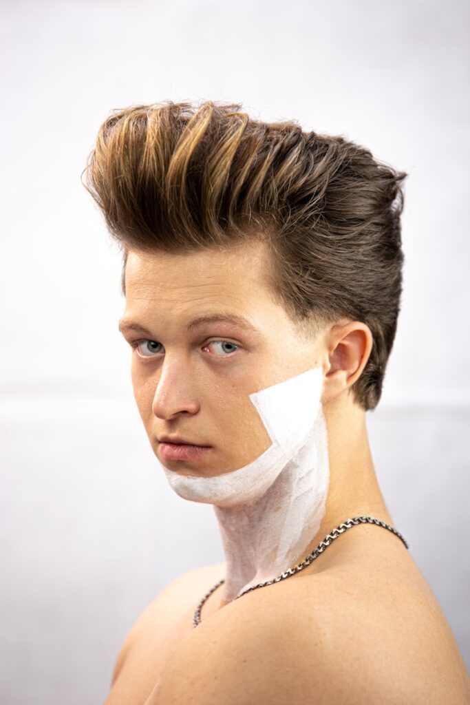 a man with a bandage around his neck