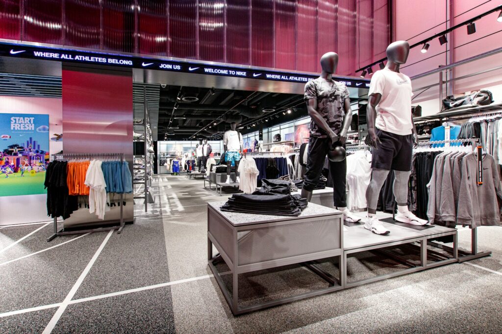 a couple of mannequins that are standing in a store