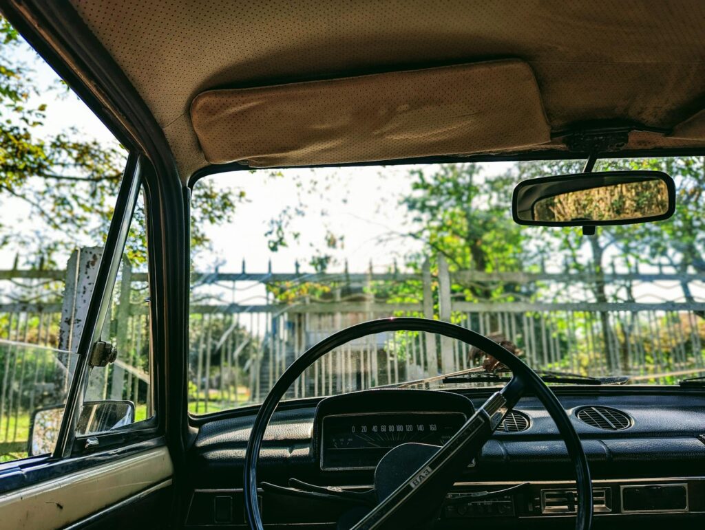 Black Steering Wheel in Old Car