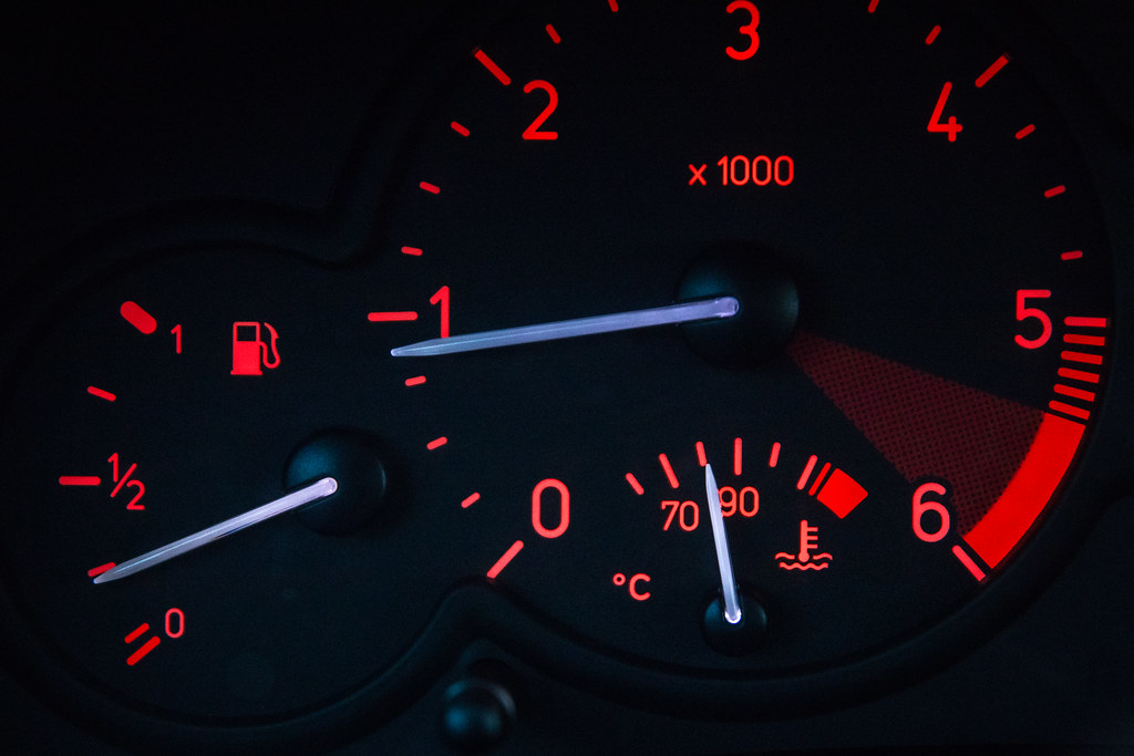 Car fuel gauge and RPM gauge. Close-up of the dashboard