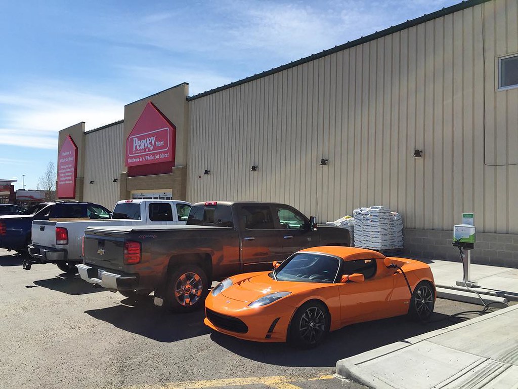 Charging the. #tesla #teslaroadster in #highriver thanks to @suncountryhwy & @peaveymart #alberta #ev #electriccar #electricvehicle