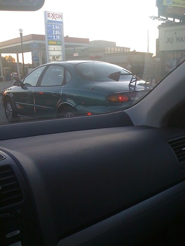 Four door Taurus with a spoiler. This car is a serious panty dropper