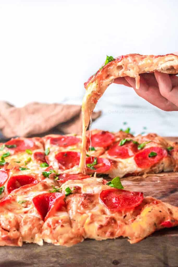 The Culinary Science of Homemade Pizza: Mastering the Art of Dough and Sauce for Unforgettable Pies