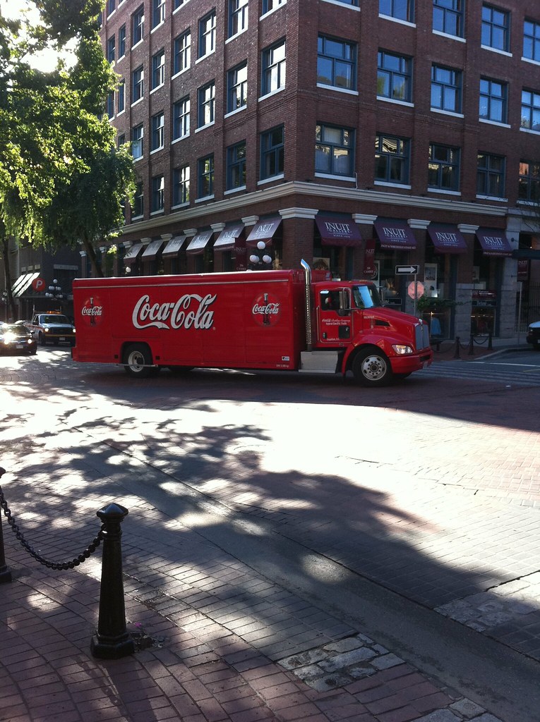 Hybrid Electric Coca-cola Delivery Truck Turns Left on Water St.
