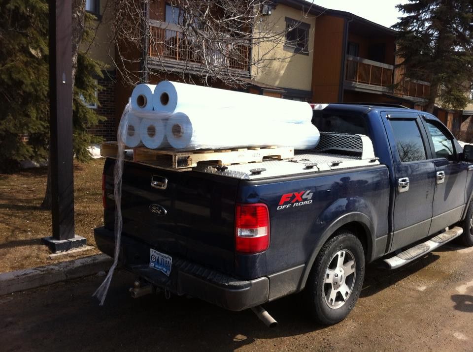 Paper-Laden Heavy-Duty Truck Bed Cover on F-150