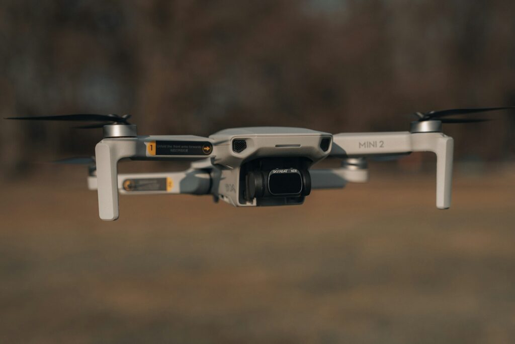 a close up of a camera attached to a flying device
