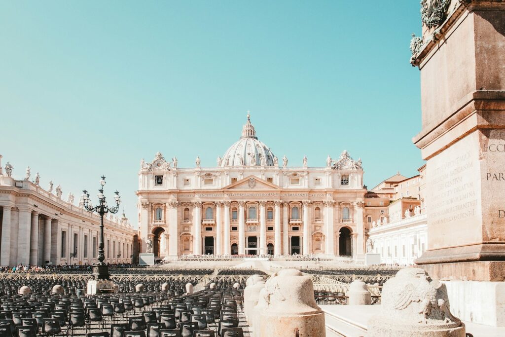a large building with a lot of chairs in front of it