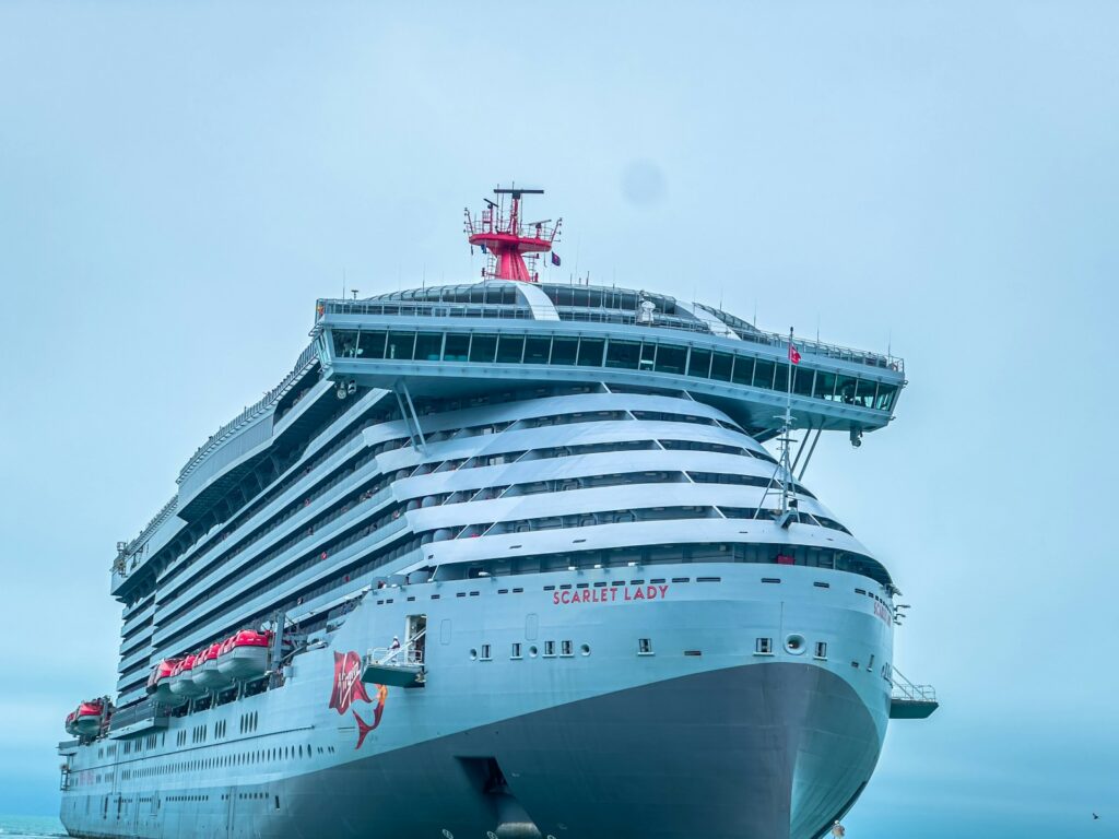 a large cruise ship docked in the water