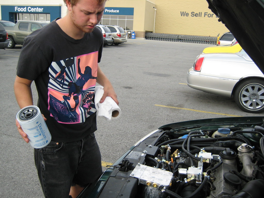 man vs. car filter change