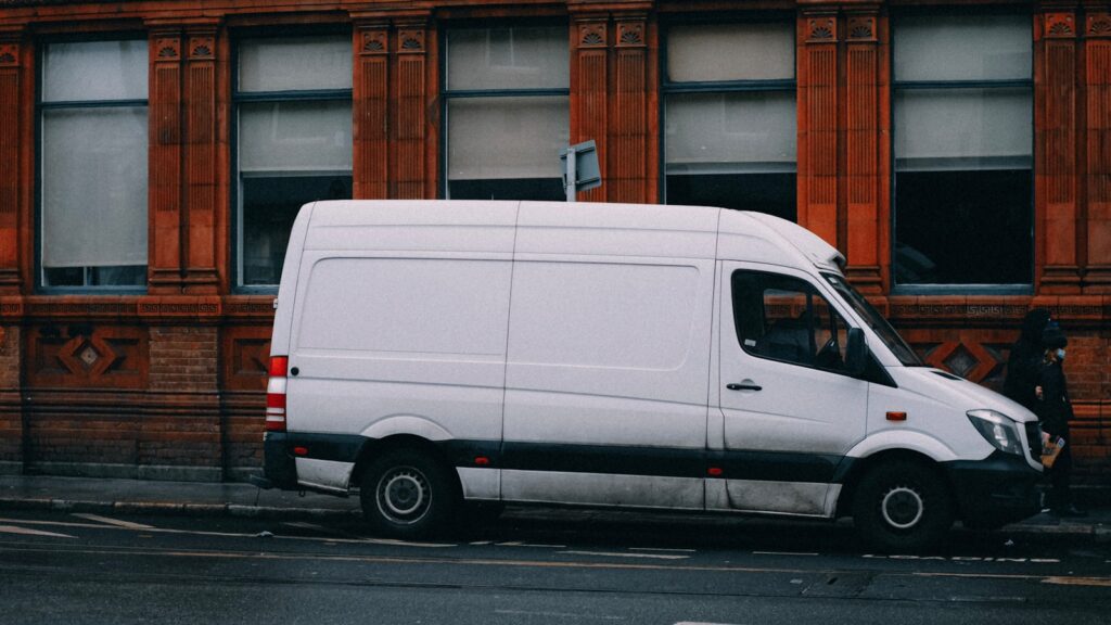a white van parked on the side of the road