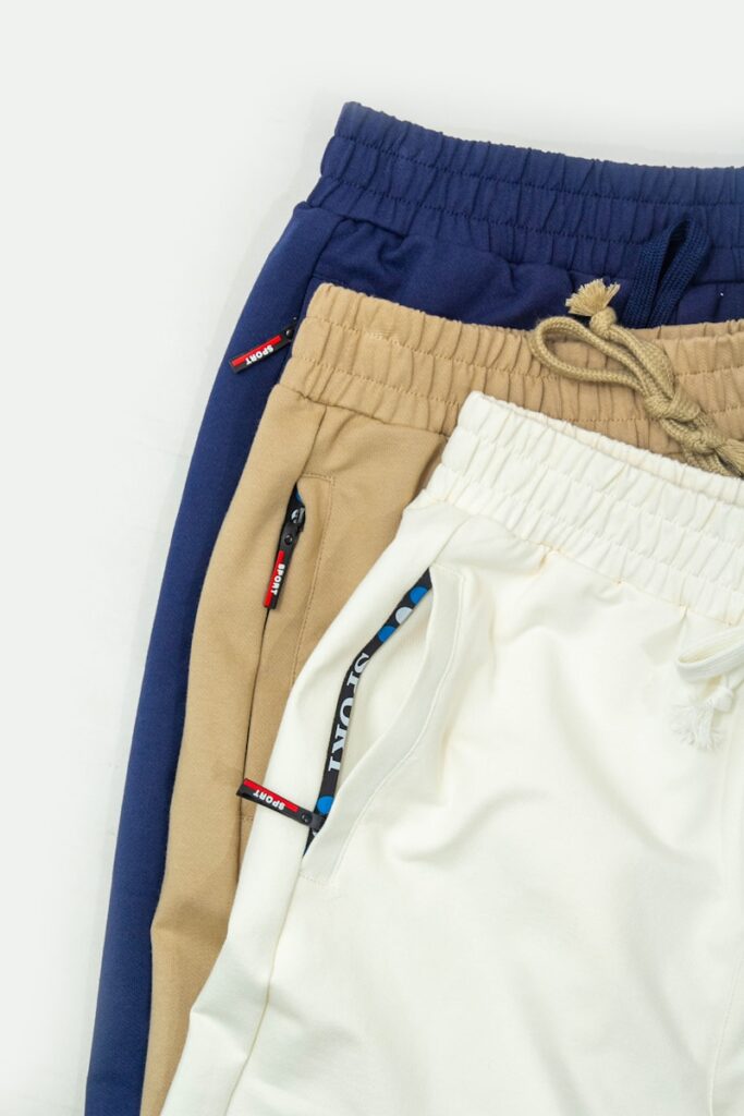 A group of three men's shorts sitting next to each other