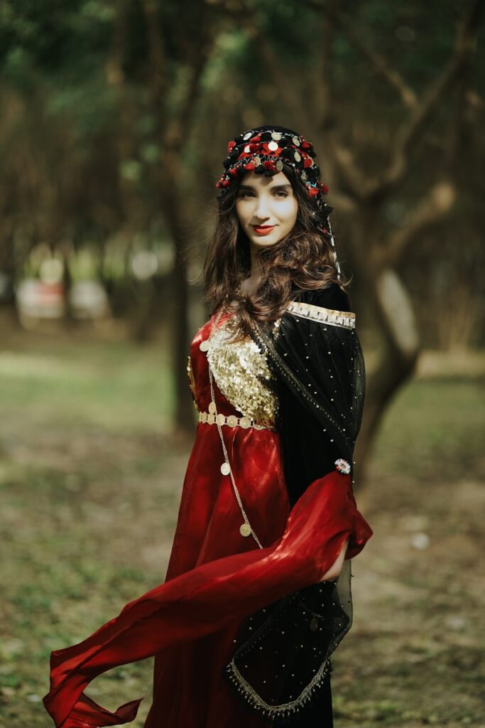 a woman dressed in a red and black costume