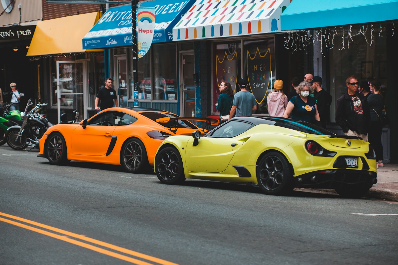 yellow ferrari 458 italia parked on street during daytime