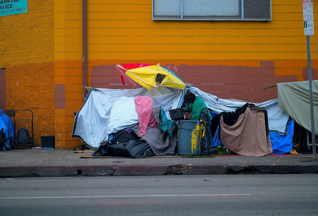 A group of tents sitting on the side of a road