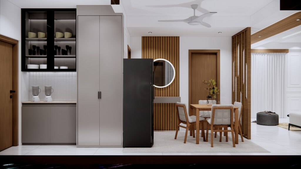 A room with a table, chairs and a refrigerator