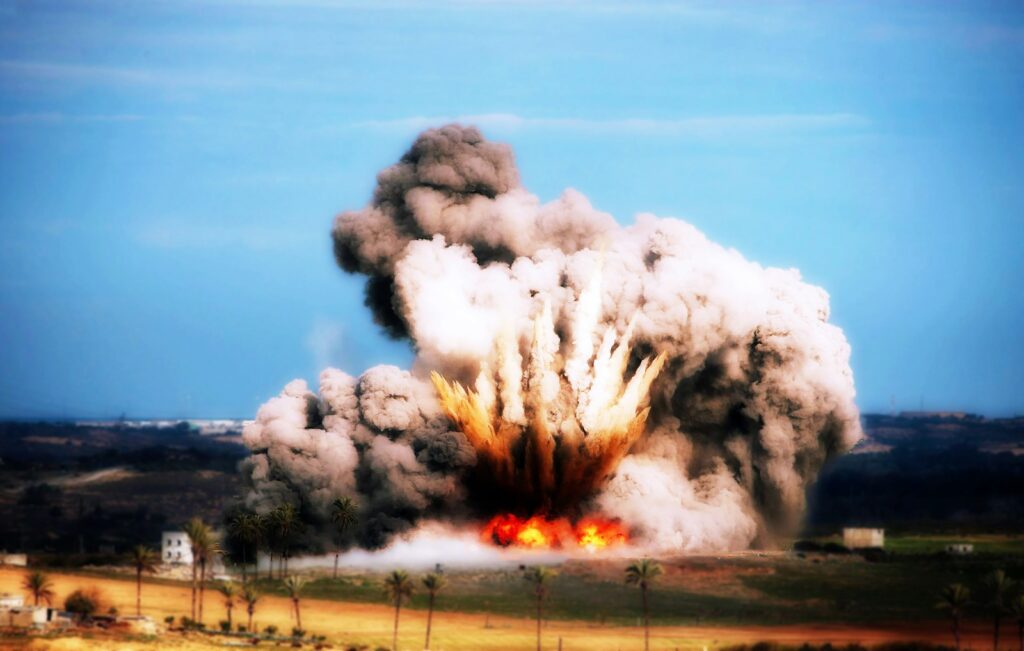 A large cloud of smoke is billowing out of the sky