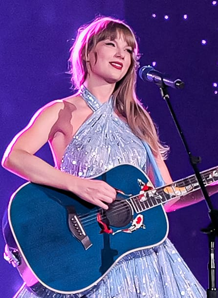 Taylor Swift’s “Showgirl” Era Unveiled: Decoding Her Iconic Red Top, Leather Miniskirt, and Album Secrets!